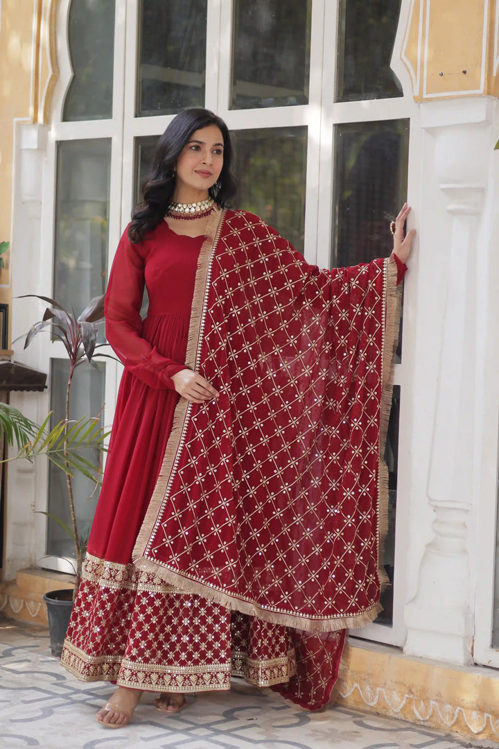 Back view red and gold embroidered Anarkalili suit.