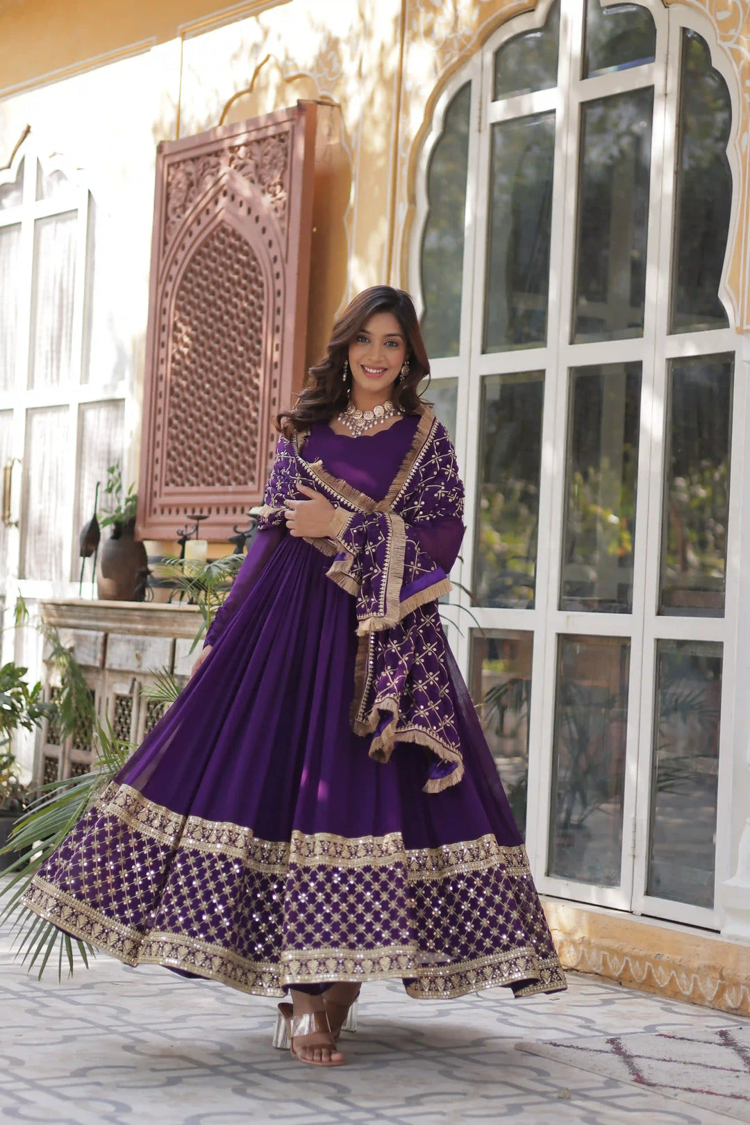 Back view purple and gold embroidered Anarkalili.