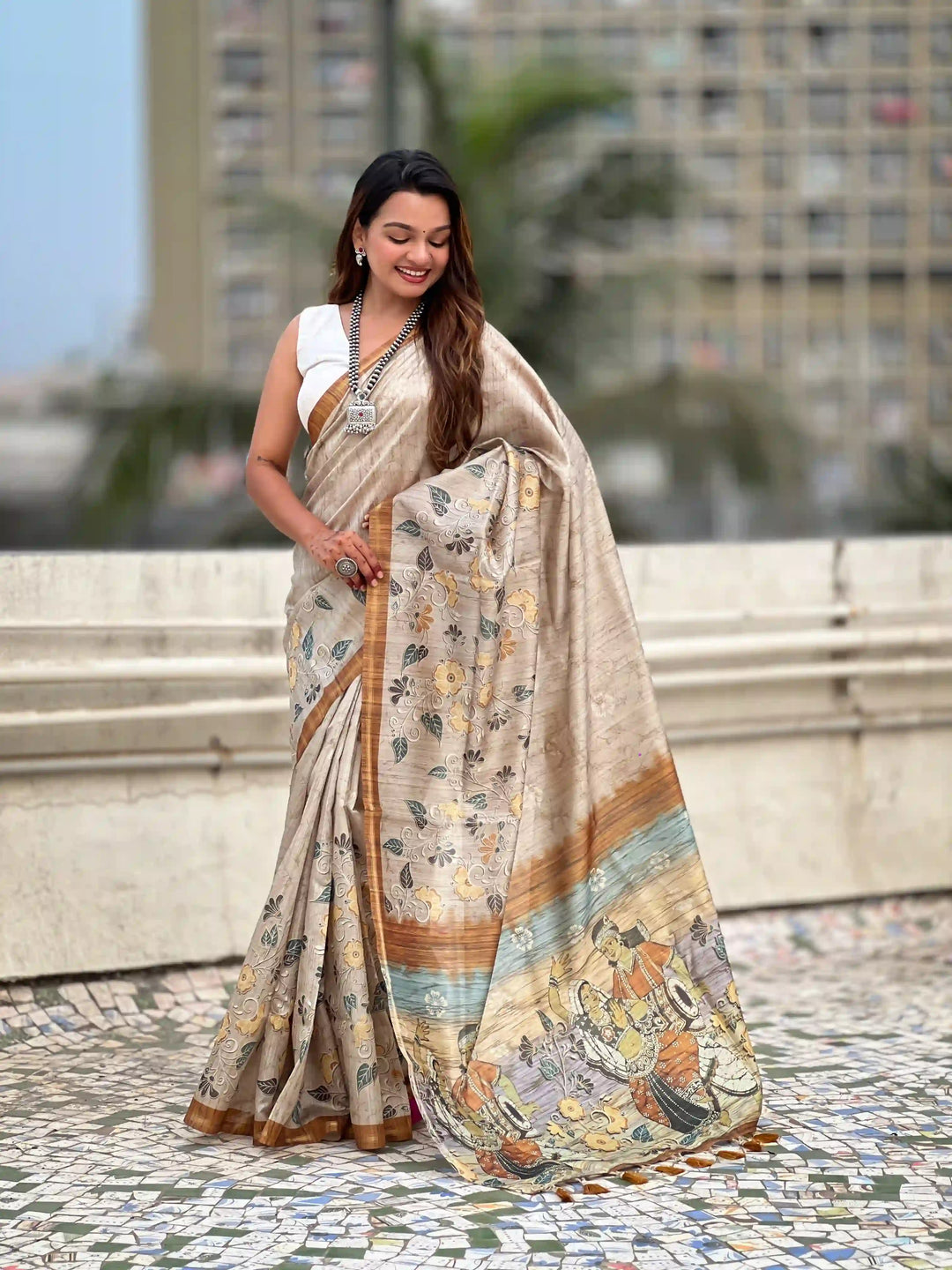 Exquisite Silk Saree with Floral Prints and Wevon Jari Border
