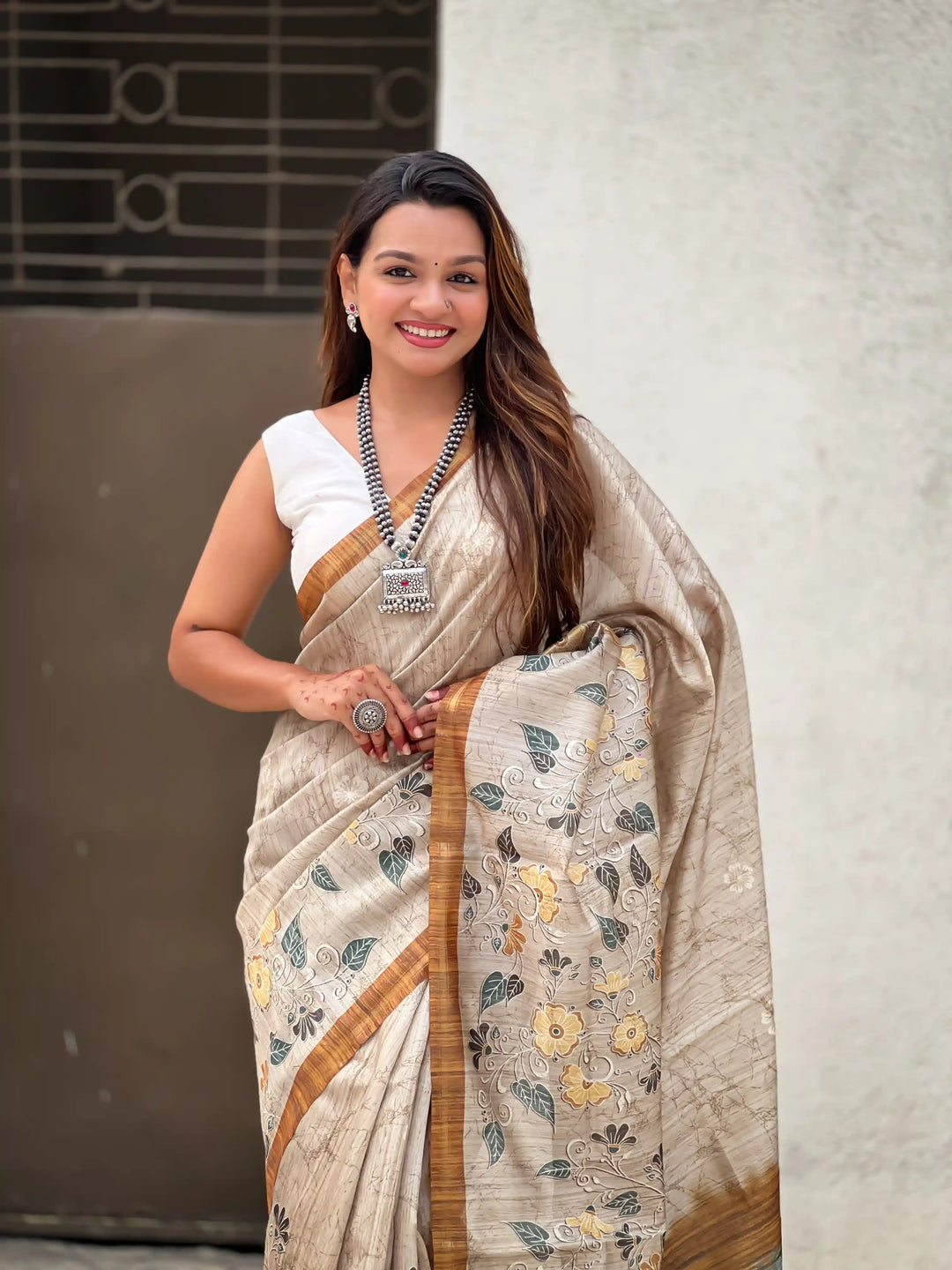 Exquisite Silk Saree with Floral Prints and Wevon Jari Border