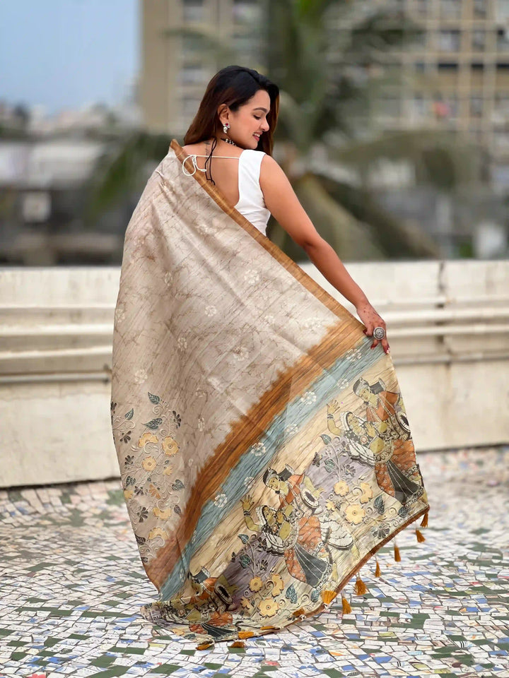 Exquisite Silk Saree with Floral Prints and Wevon Jari Border