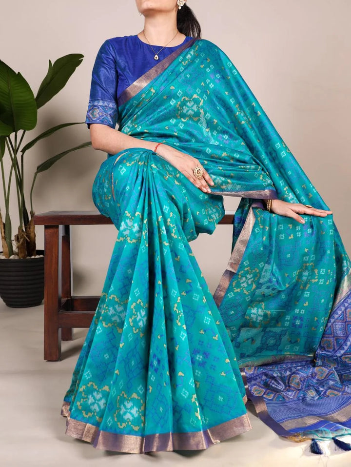 Elegant Raw Silk Saree with Zari Border & Tassels for Festive Wear