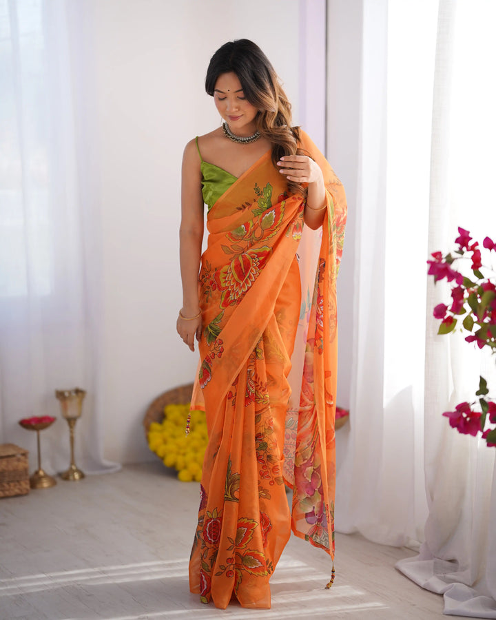 Charm in Every Drape – Designer Printed Orange Saree