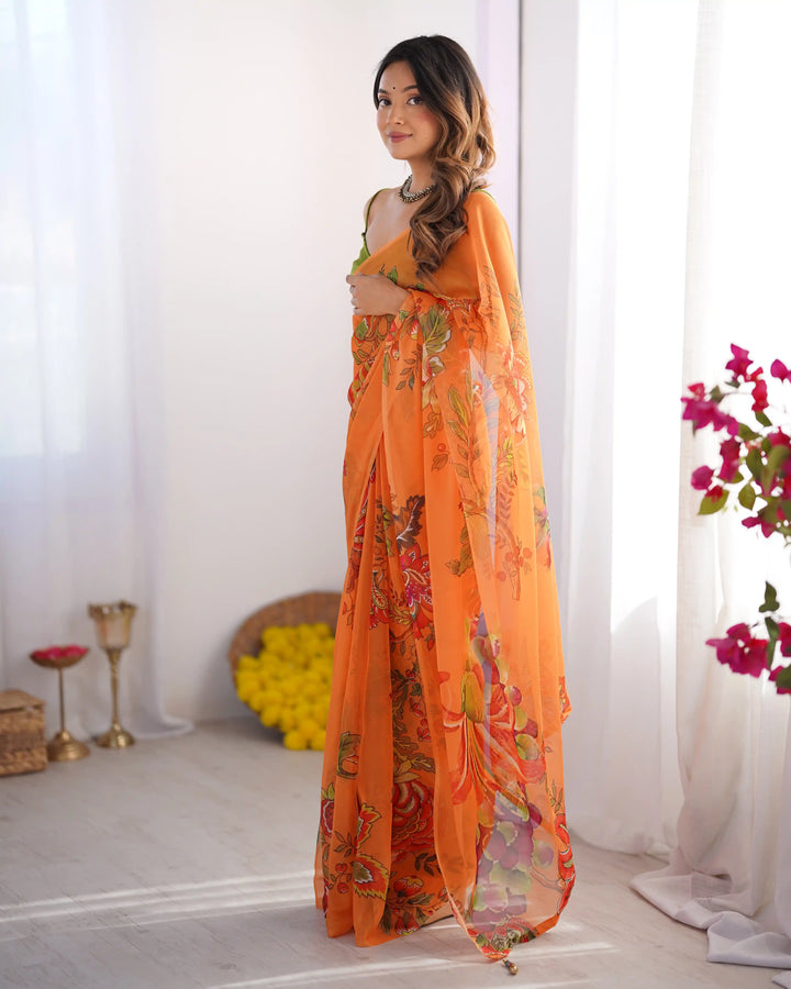 Charm in Every Drape – Designer Printed Orange Saree