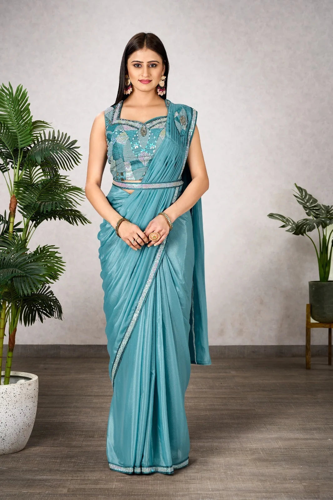 Shine Bright in this Designer Shimmer Georgette Saree