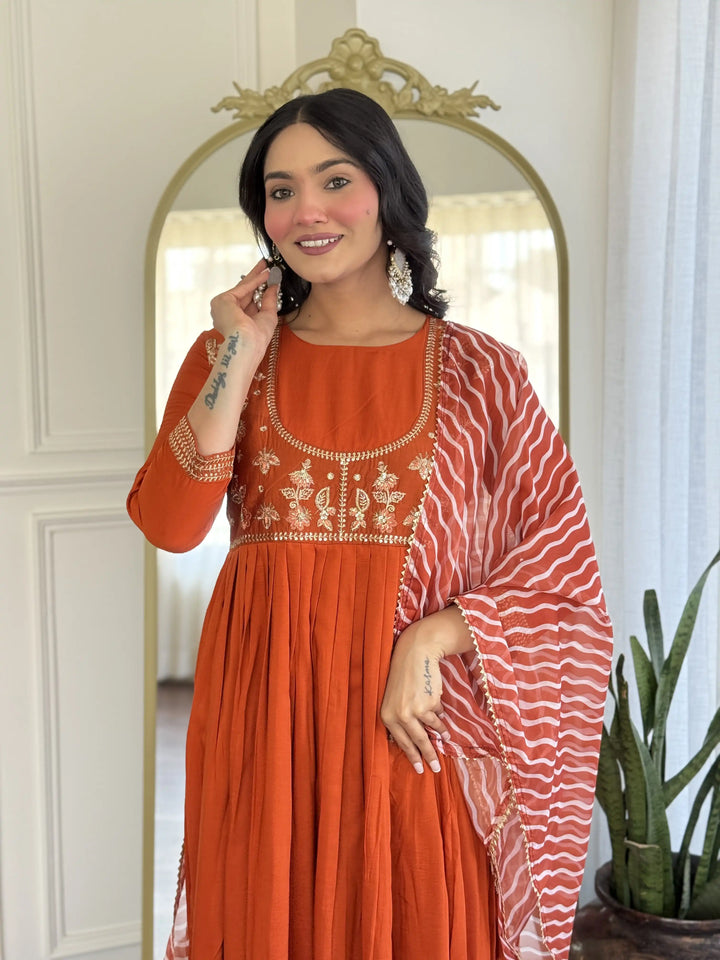 Vibrant Orange Silk Salwar Suit with Printed & Embroidered Design