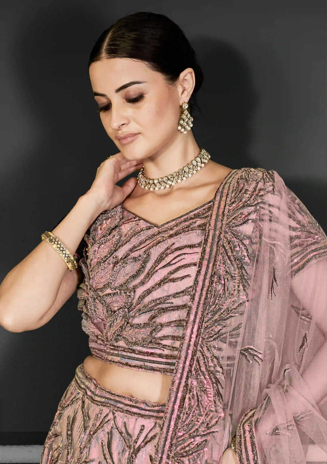 Exquisite Net Lehenga Choli Set with Embroidered Detailing