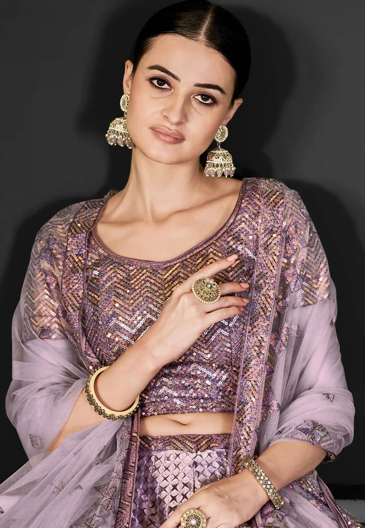 Timeless Net Lehenga Choli with Intricate Embroidery Work