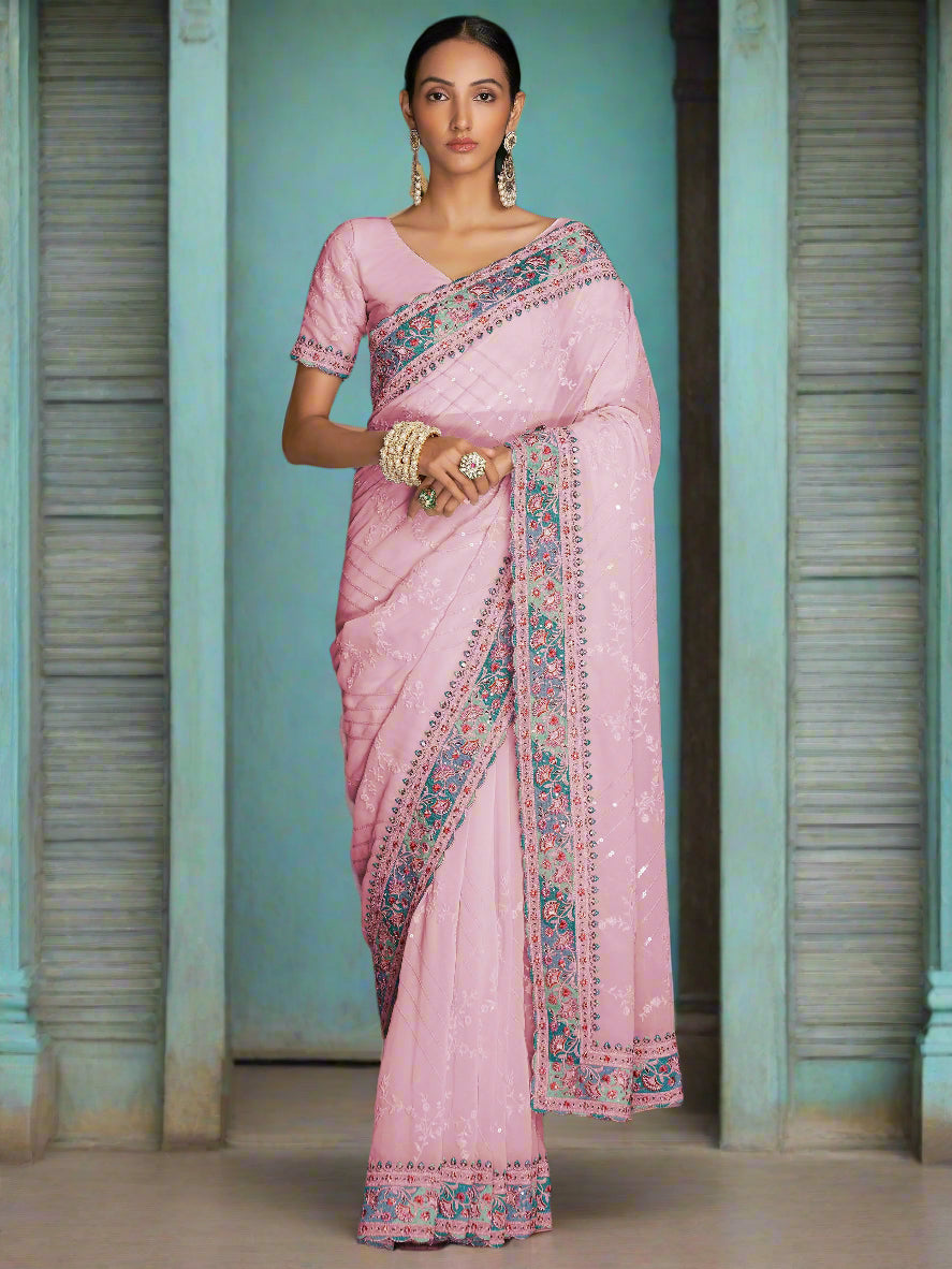 Pink georgette saree crafted for elegance and style.