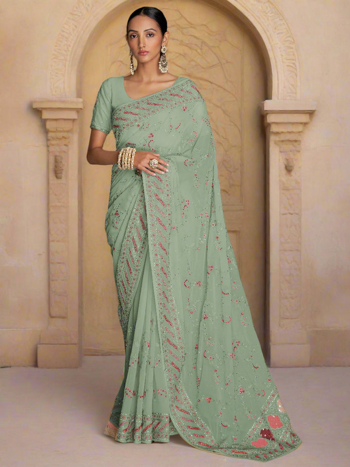 Green georgette saree crafted for elegance and style.