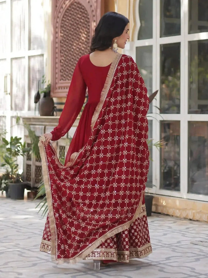 Full view red and gold embroidered Georgrtte.