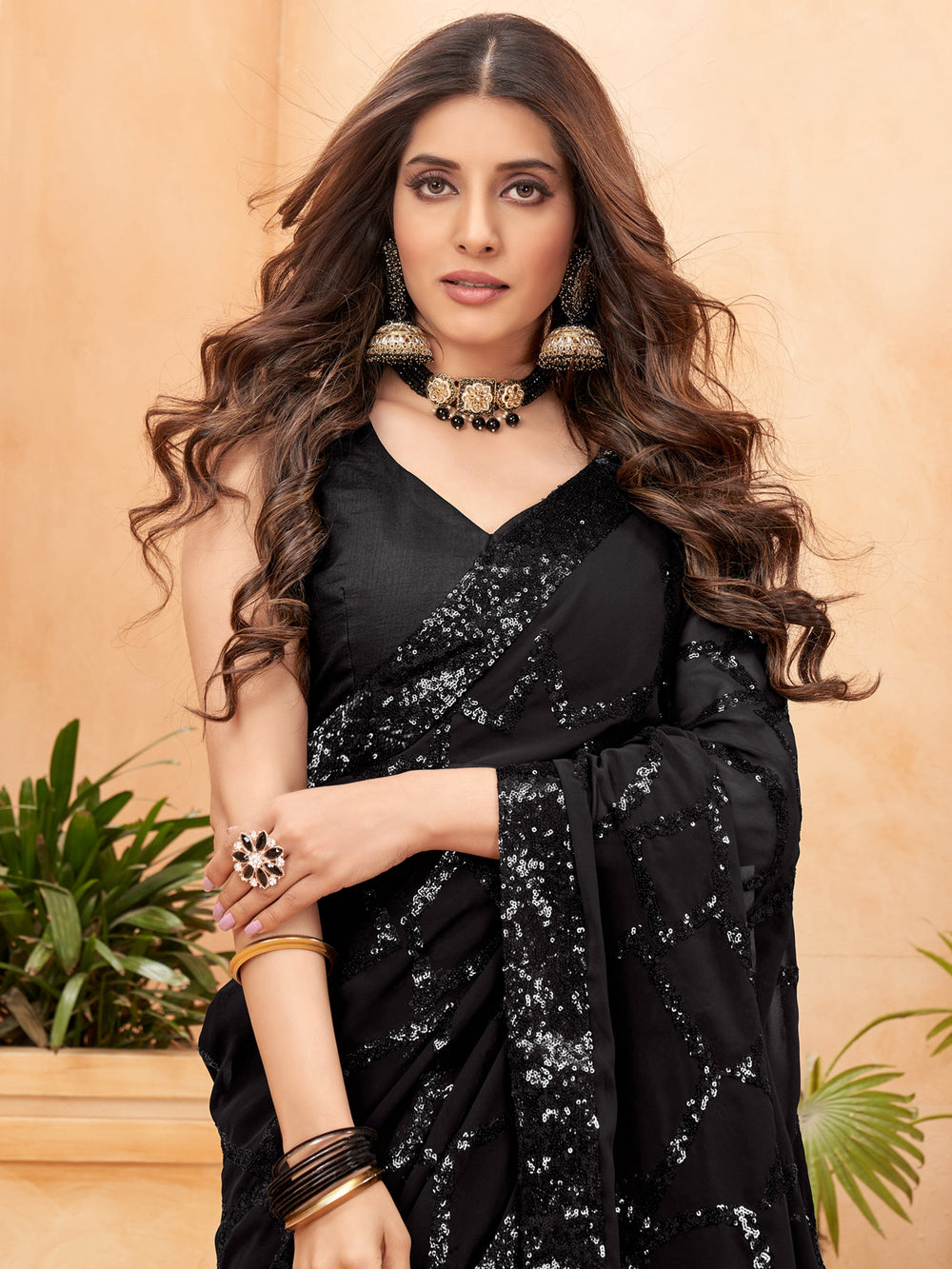 Astonishing Black Sequins Georgette Saree for Reception Wear
