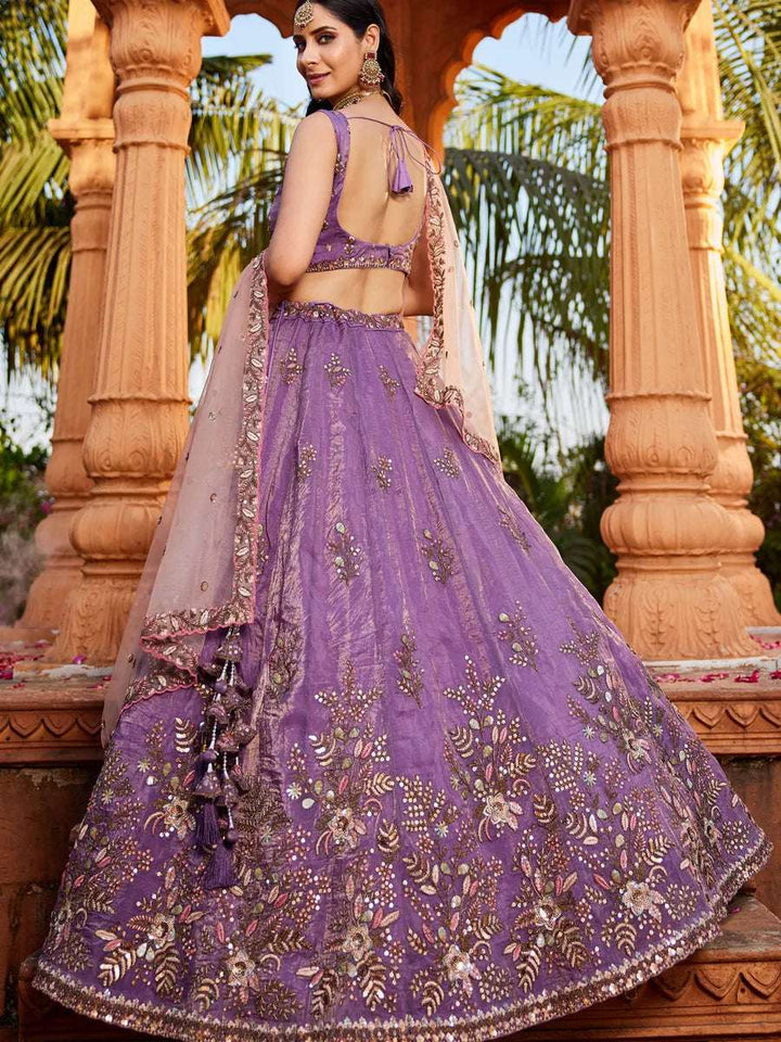 Beaded purple lehenga with net dupatta