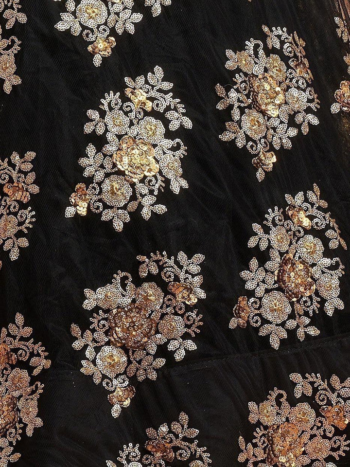 Black bridal lehenga with zari and net dupatta