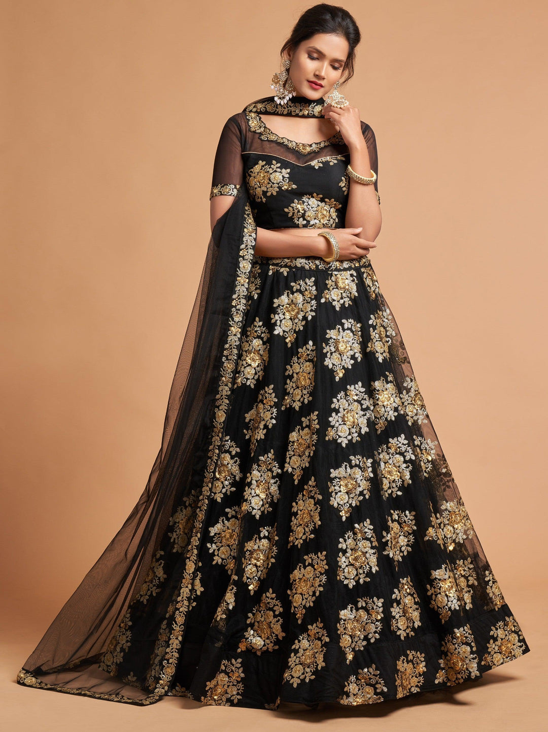 Black net lehenga with zari embroidery