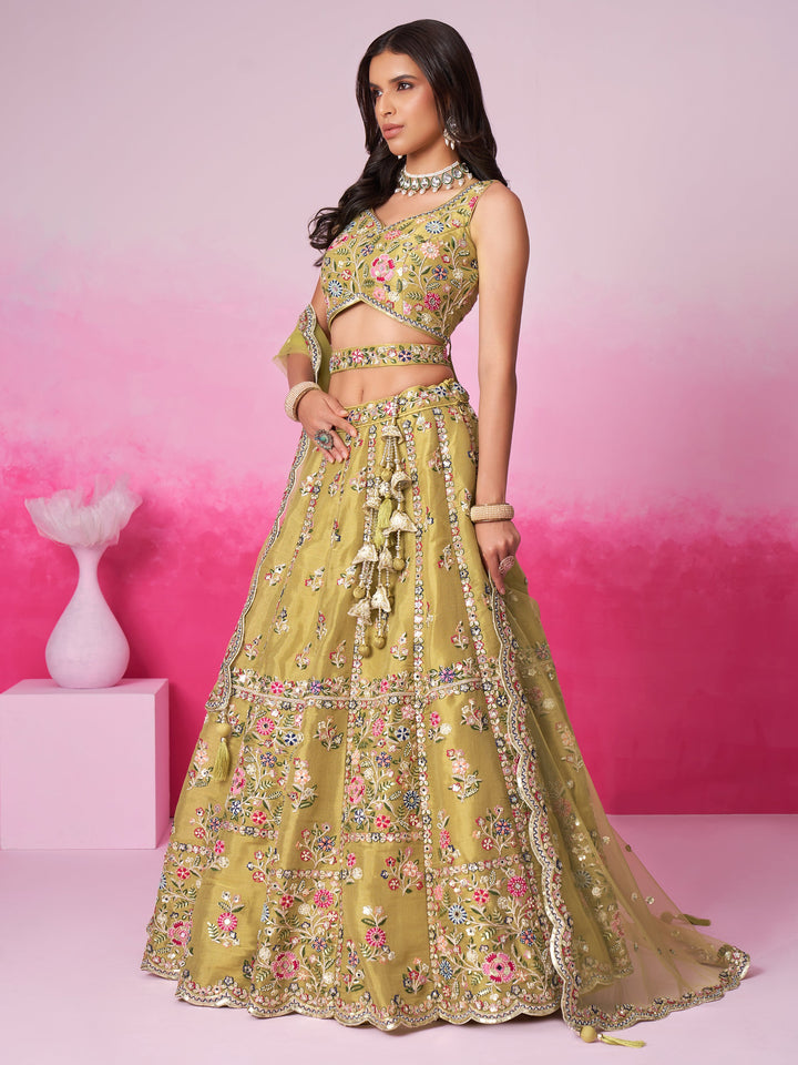 Buy luxurious mustard green lehenga choli in silk fabric