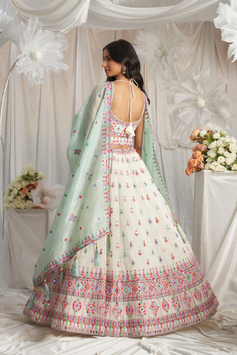 Buy off-white lehenga choli with designer embroidery for parties