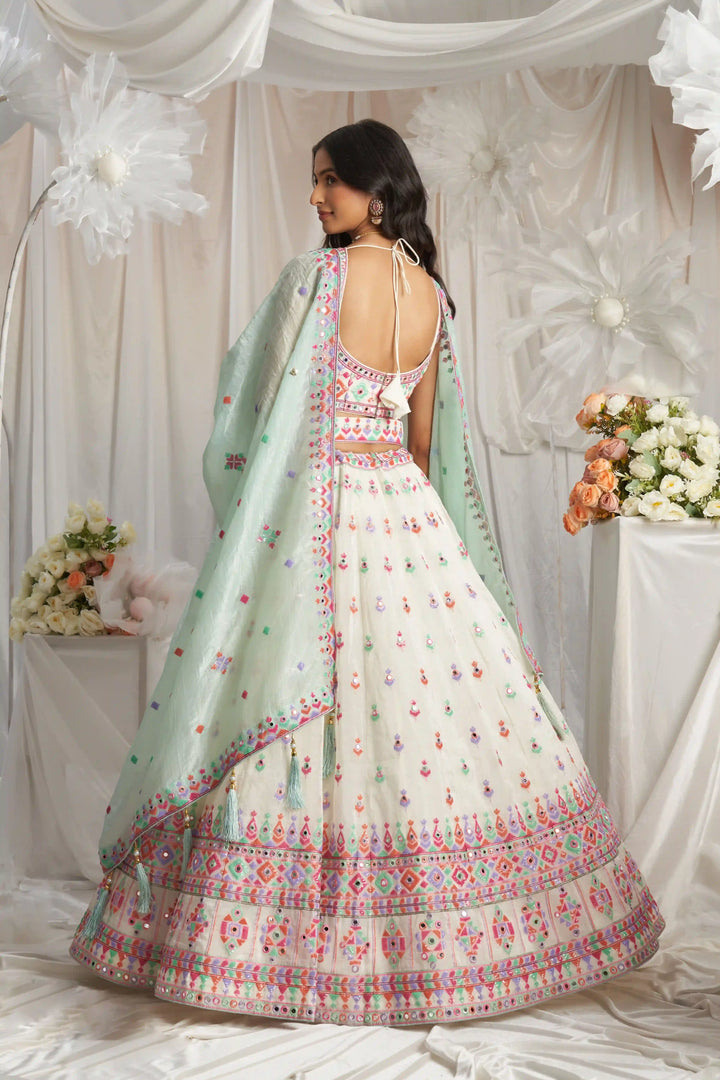 Buy off-white lehenga choli with designer embroidery for parties
