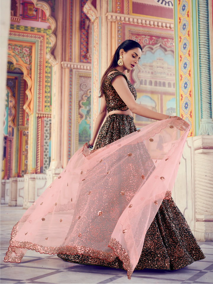 Buy stunning black lehenga with sparkling designs and peach dupatta