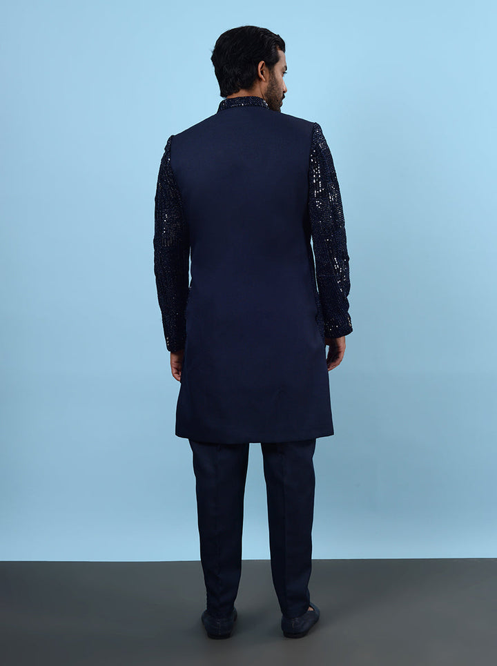 Stylish navy velvet attire, classic mandarin collar design