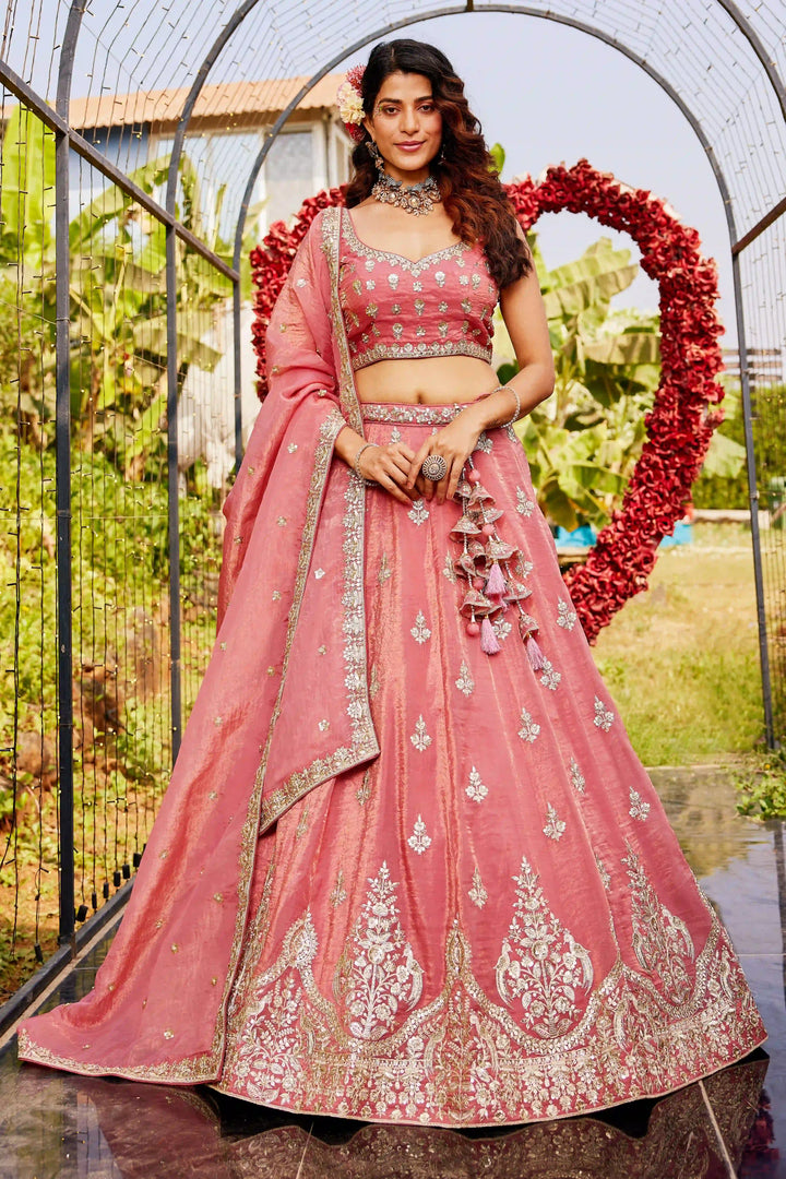 Coral pink organza lehenga with sequins