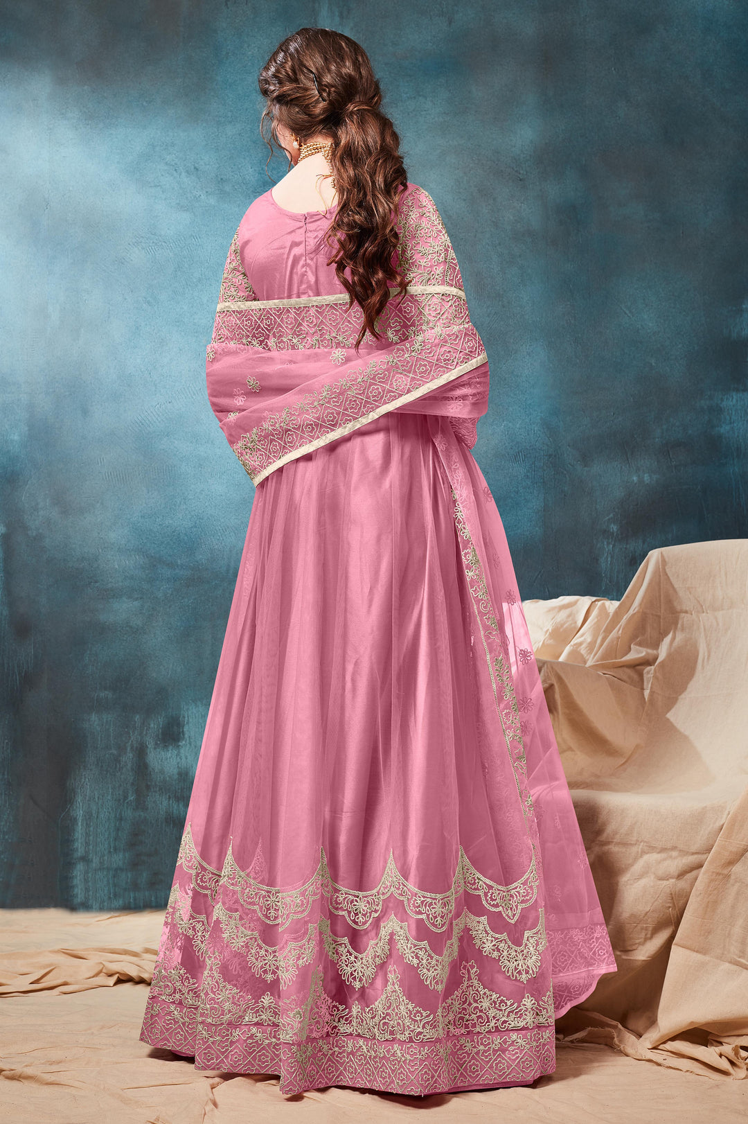 Beautifully designed light pink Anarkali Set with intricate embellishments, ideal for weddings and celebrations.