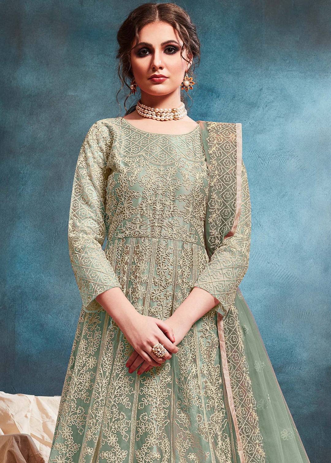 Beautifully crafted pista Anarkali Set, ideal for weddings and celebrations with luxurious fabric and exquisite embellishments.