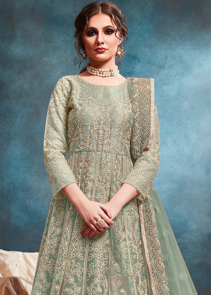 Beautifully crafted pista Anarkali Set, ideal for weddings and celebrations with luxurious fabric and exquisite embellishments.
