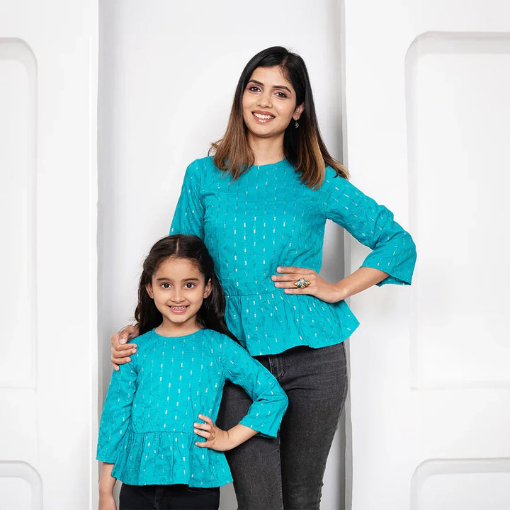 Twinning in Style: Blue & Silver Peplum Tops for Mom & Daughter