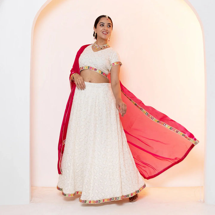 Sparkling White Emroidered Lehenga Choli with Pink Dupatta