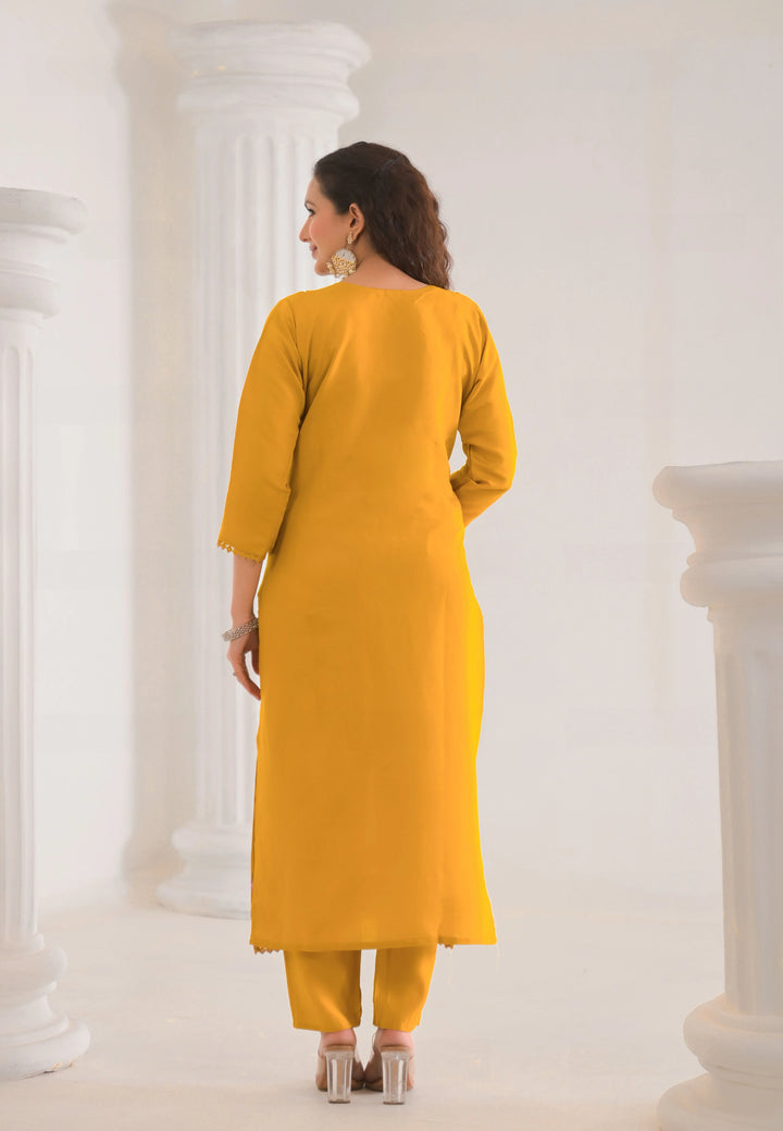 Designer mustard embroidered suit for party wear
