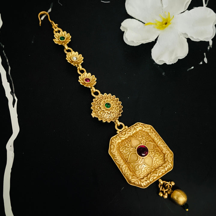 Golden Tika | Traditional Indian Jewelry for Festivals & Celebrations