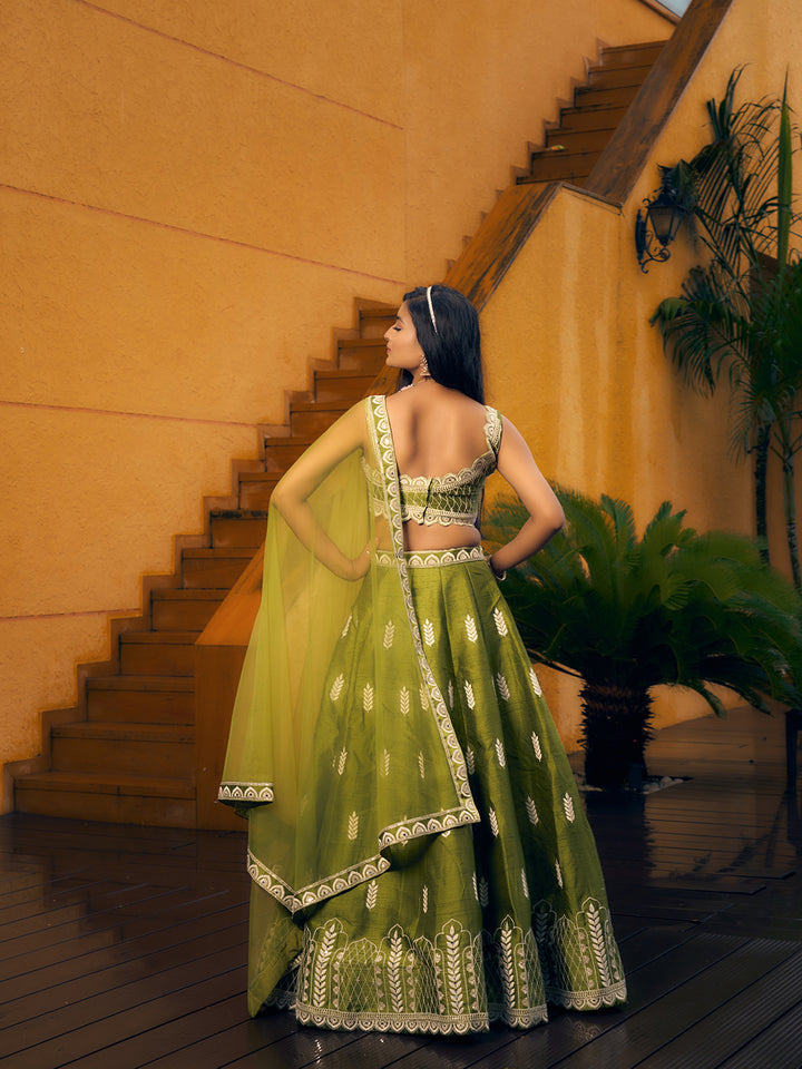 Green lehenga choli with detailed embroidery