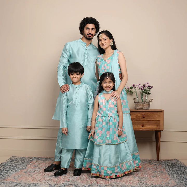 Shining Aqua Blue Lehenga and Peplum Top Set With Matching Kurta Pyjama for Family