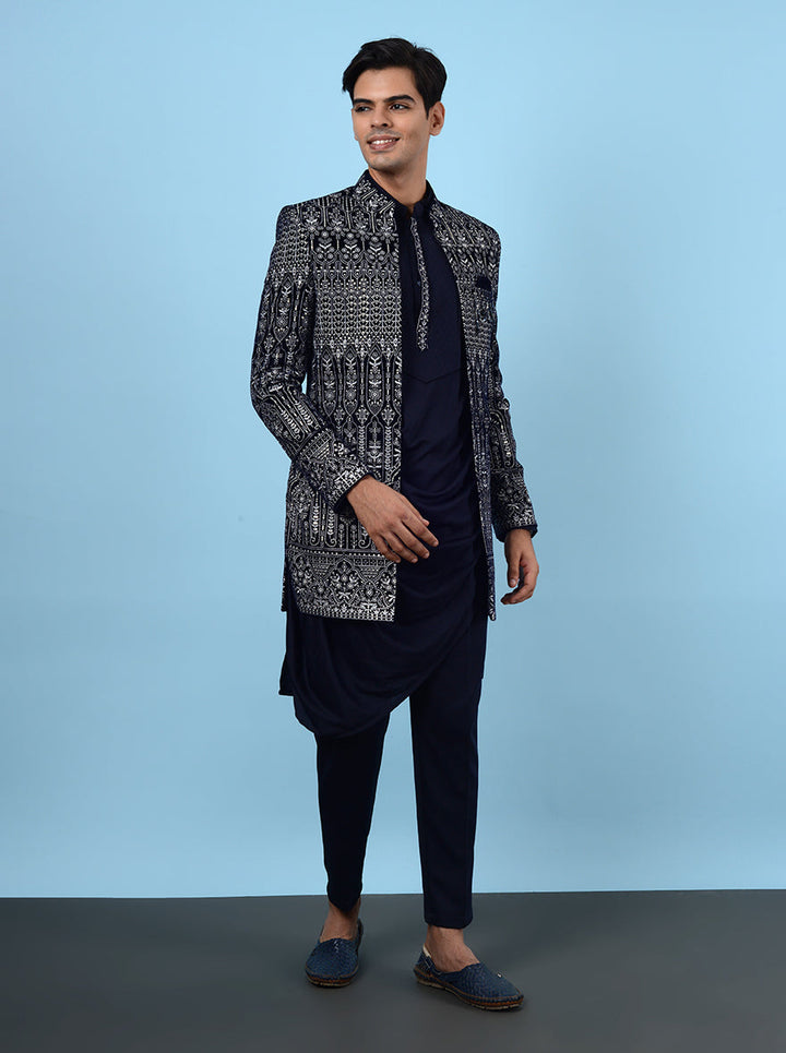 Men’s navy velvet attire, perfect for reception events