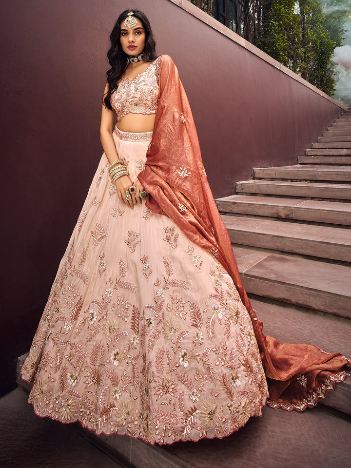 Charming Peach Embroidered Rayon Engagement√É‚Äö√Ç¬†Wear Lehenga Choli