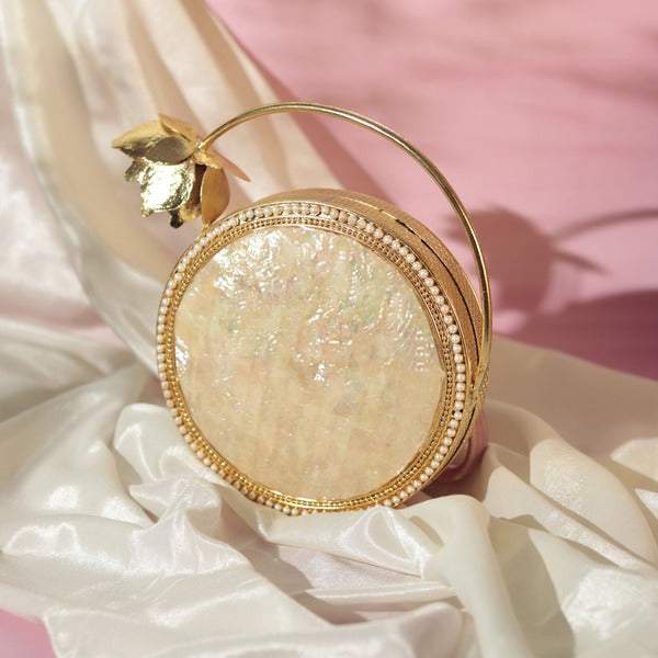 Naaz Embellished Mother of Pearl Clutch | Elegant Brass Flower Handle Bag
