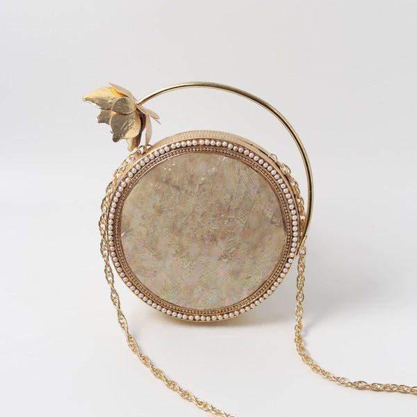 Naaz Embellished Mother of Pearl Clutch | Elegant Brass Flower Handle Bag