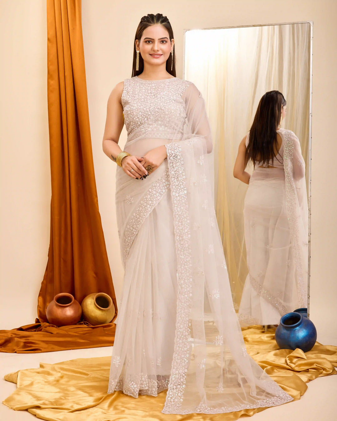 Off-White Sophisticated Soft Net Saree

