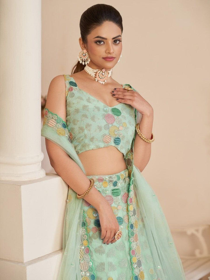 Order mint net lehenga choli for weddings and parties