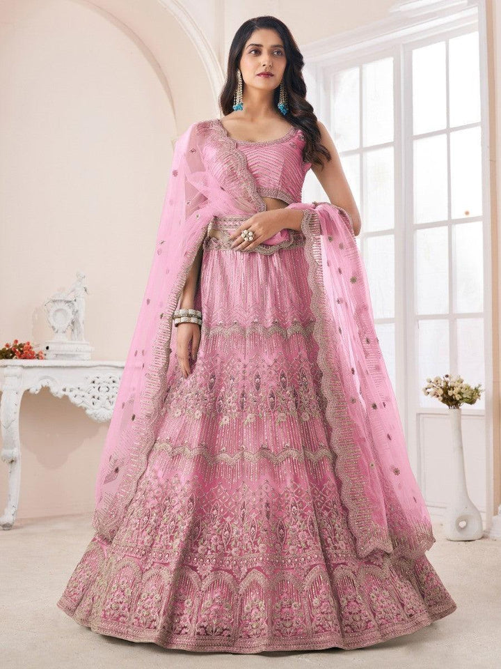 Pink net lehenga with sequins work