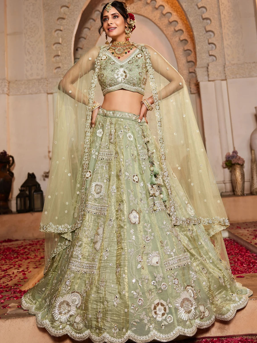 Pista green tissue lehenga with stone work