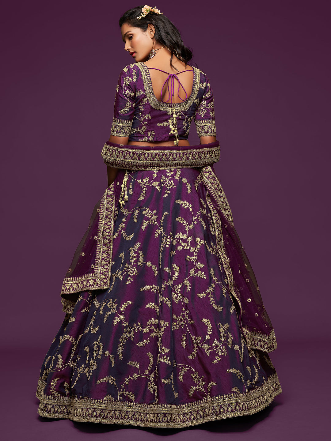 Traditional purple lehenga with four-side lace and embroidery dupatta.