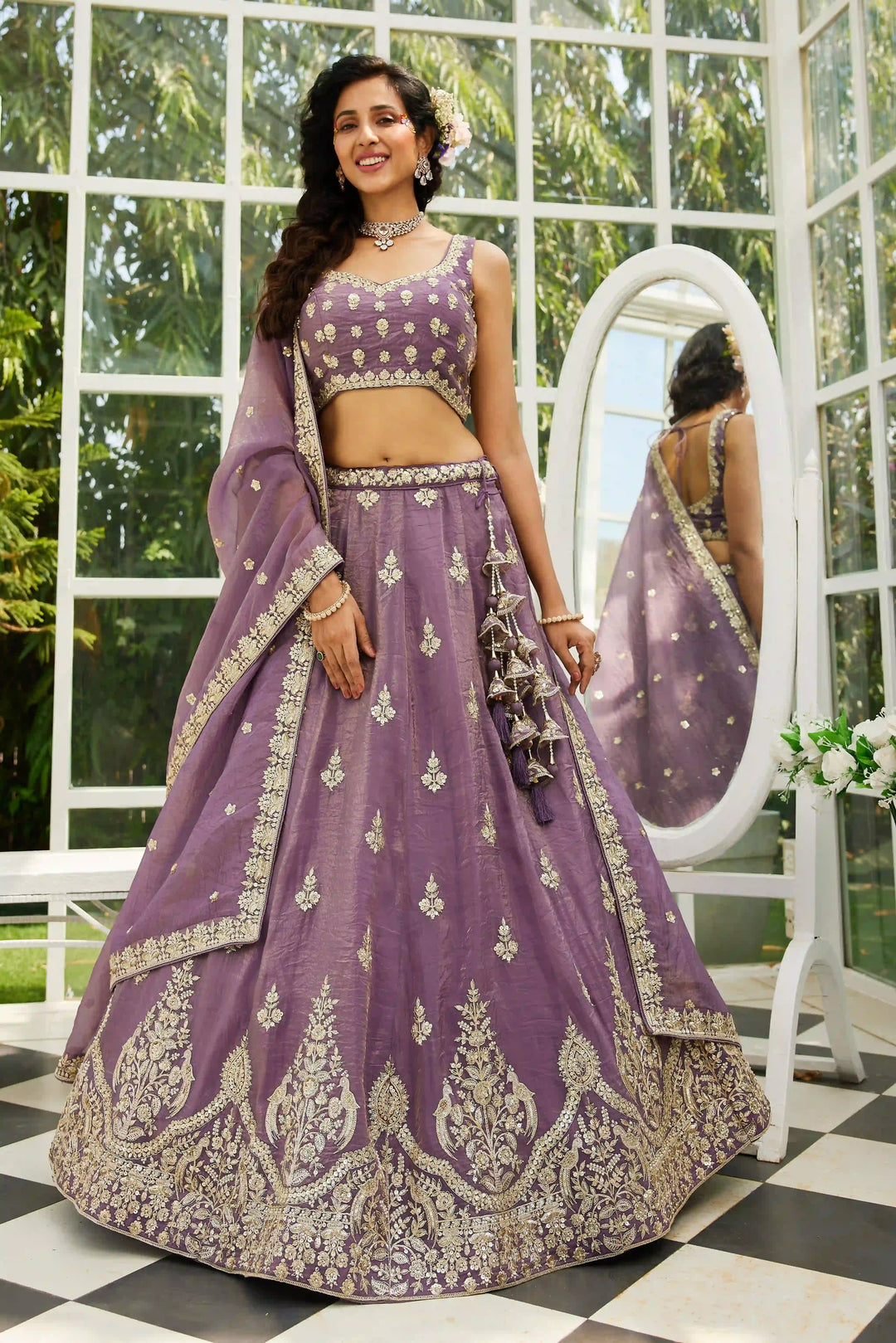 Purple organza lehenga with delicate work