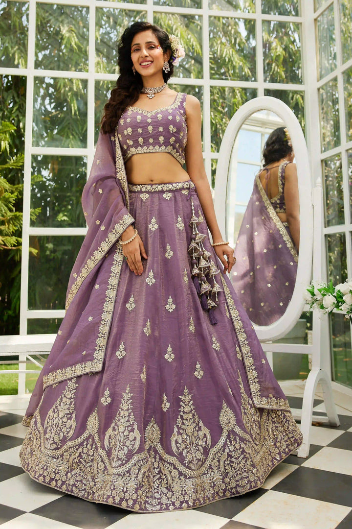 Purple organza lehenga with delicate work