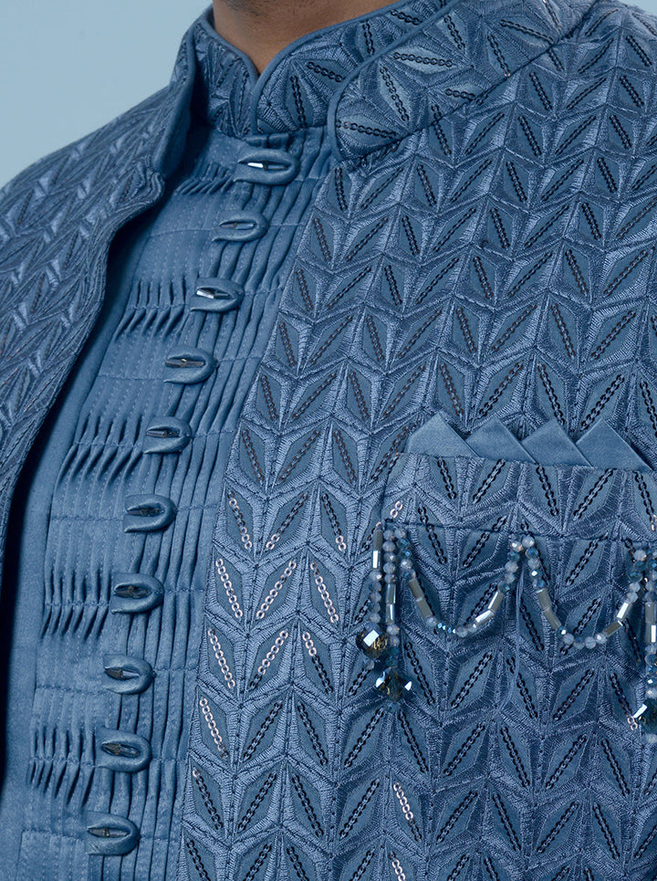 Blue men’s Indowestern with resham work on kurta yoke and hem