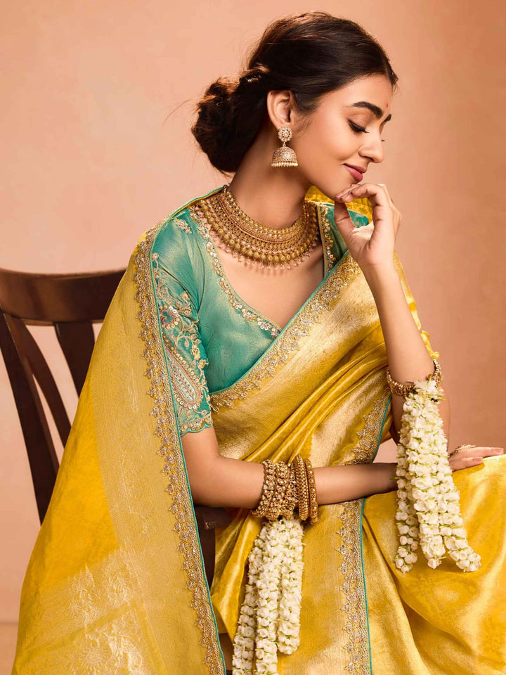 Ravishing Yellow Zari Weaving Silk Haldi Wear Saree With Blouse