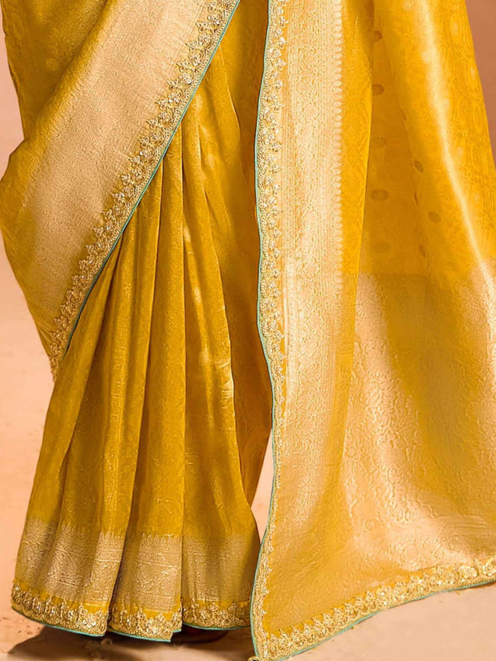 Ravishing Yellow Zari Weaving Silk Haldi Wear Saree With Blouse
