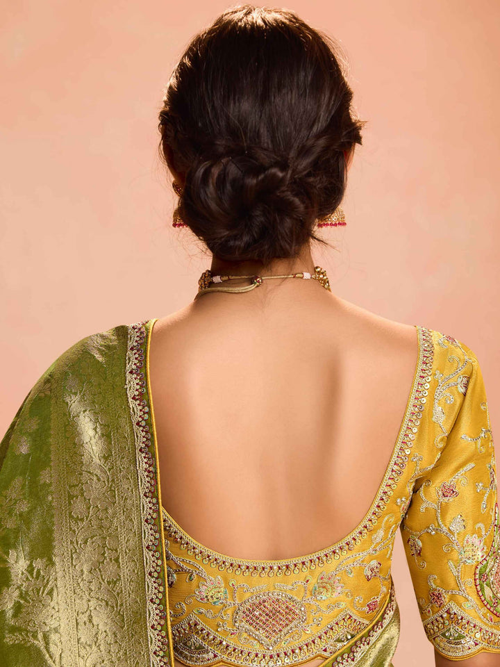 Delightful Green Zari Weaving Silk Mehendi Wear Saree With Blouse