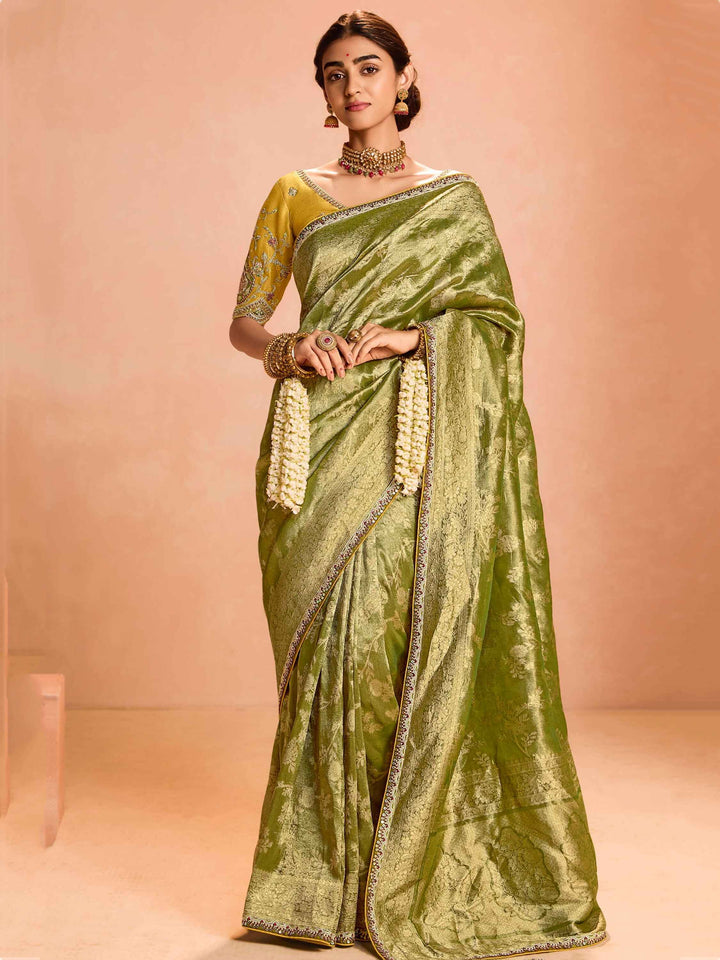 Delightful Green Zari Weaving Silk Mehendi Wear Saree With Blouse